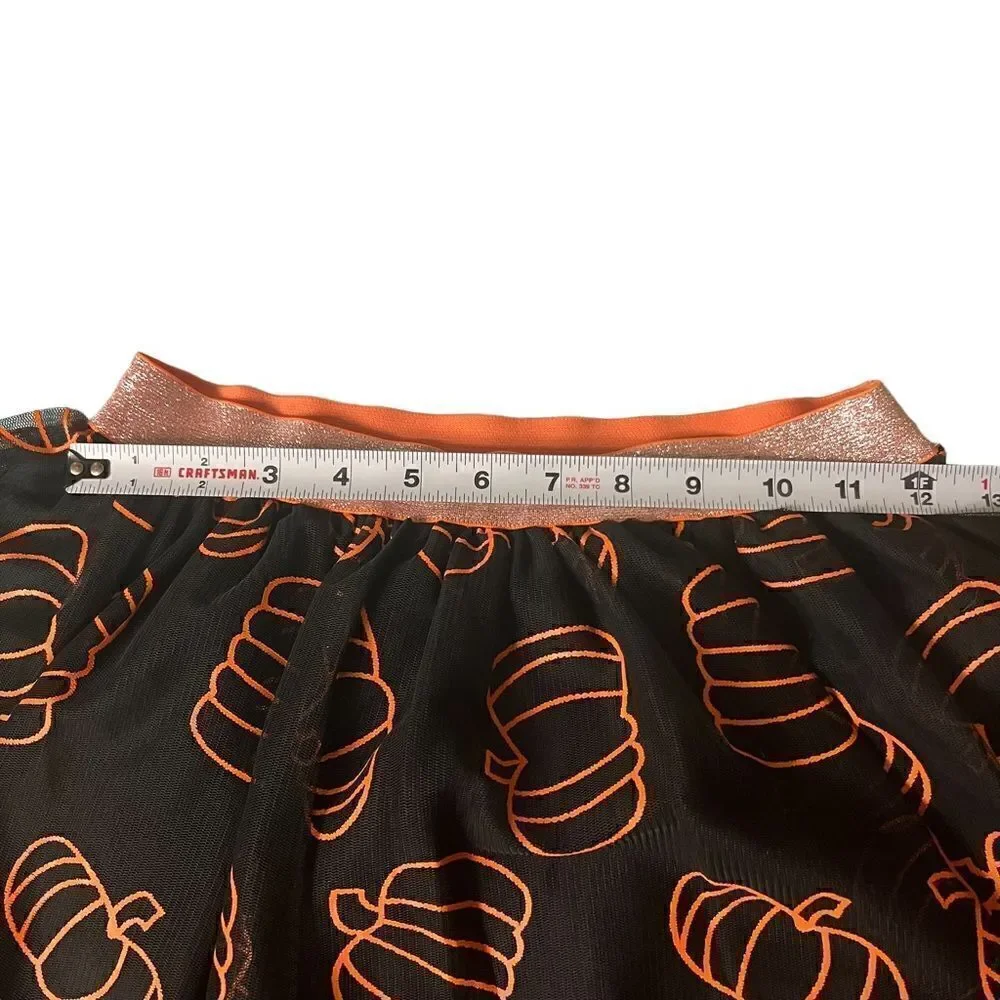 Black tutu orange pumpkins adorn this adorable fall Cat & Jack skirt